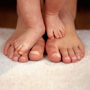 baby and parent feet